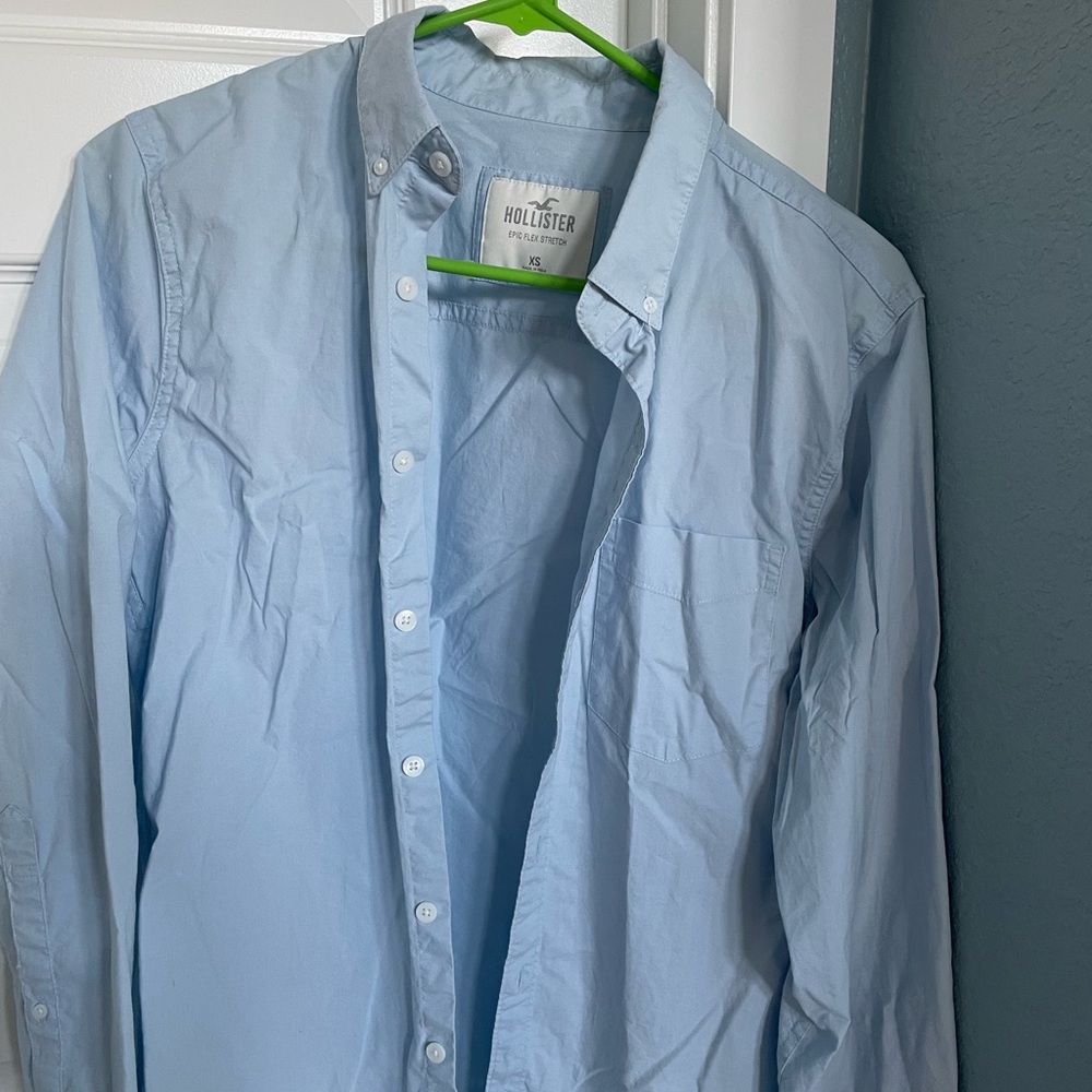 Hollister XS Men’s light blue button down shirt.